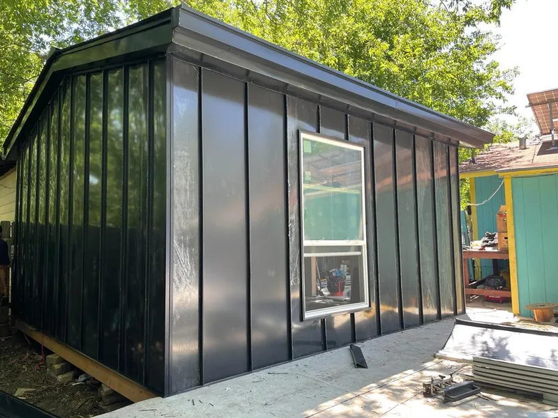 Black standing seam metal wall panels for Metal Roof Installation in Holden