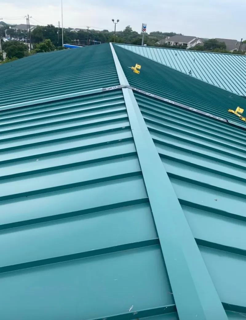 Green commercial metal roof ridge and valley for Metal Roof Repair in Holden